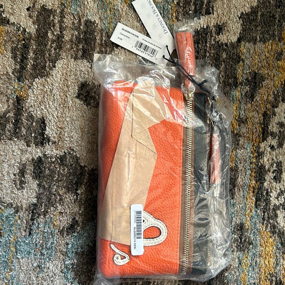 Baltimore Orioles Leather Dooley & Burke Wristlet.  Double zip Brand New